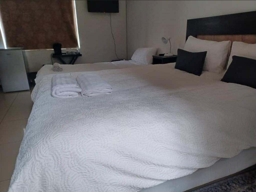 Carlo'S Boutique Guesthouse ولفس بي الغرفة الصورة