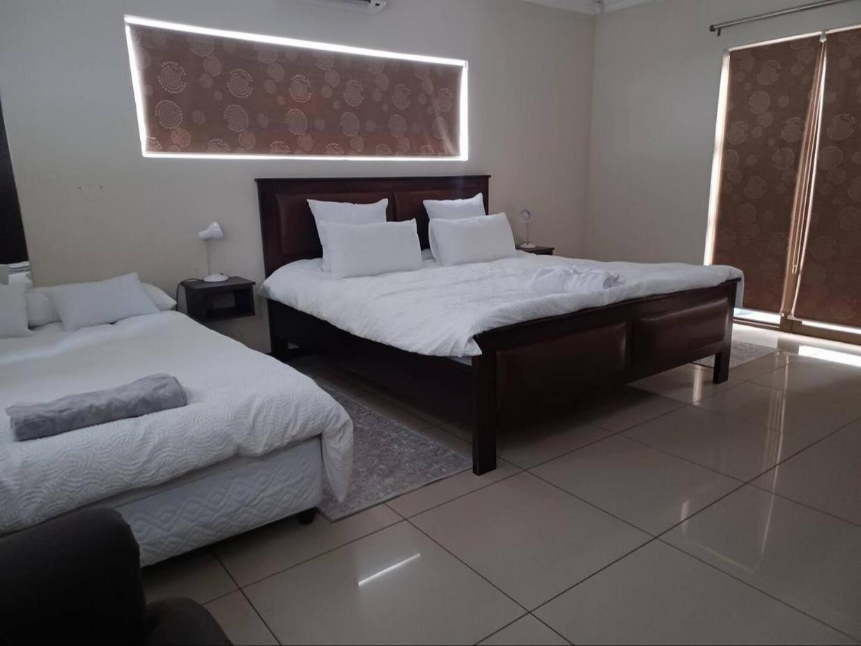 Carlo'S Boutique Guesthouse ولفس بي الغرفة الصورة